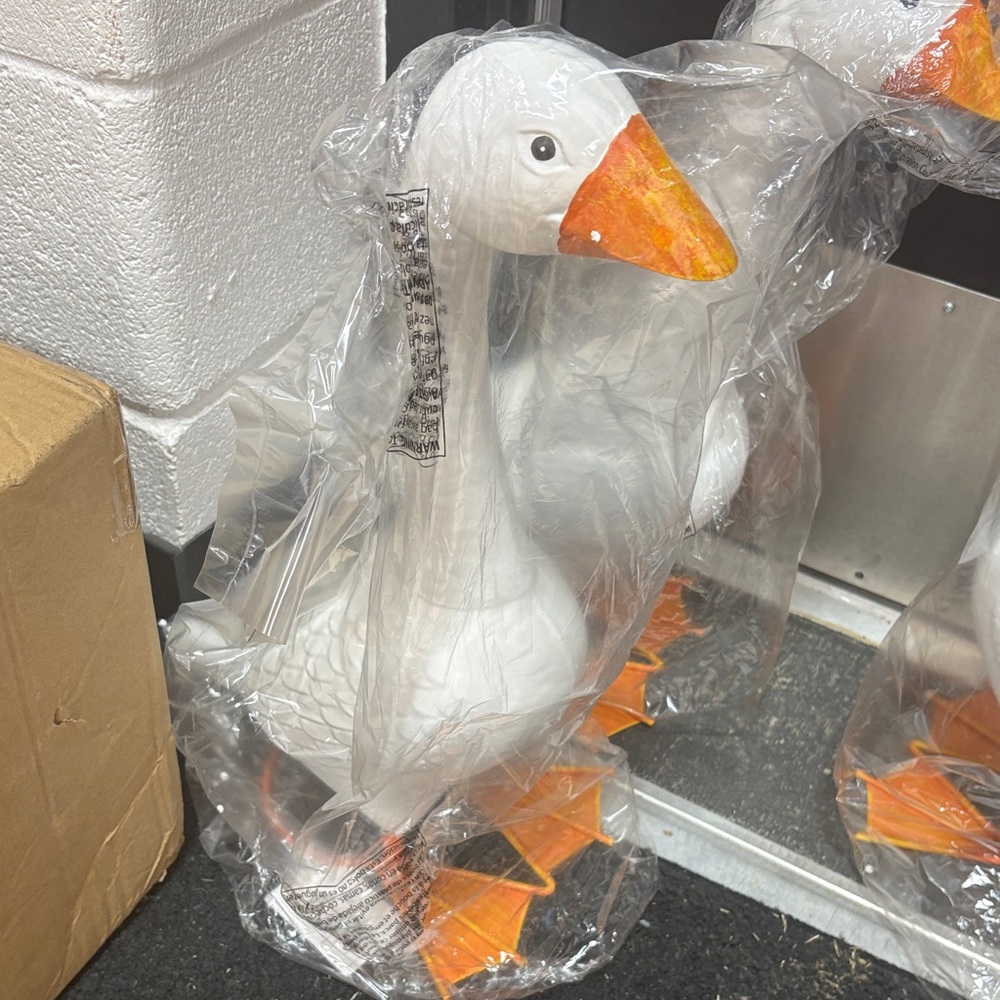 Viral Giddy metal porch goose